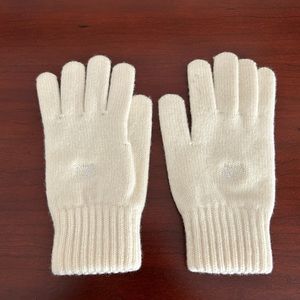 Burberry lamb’s wool cream colored.